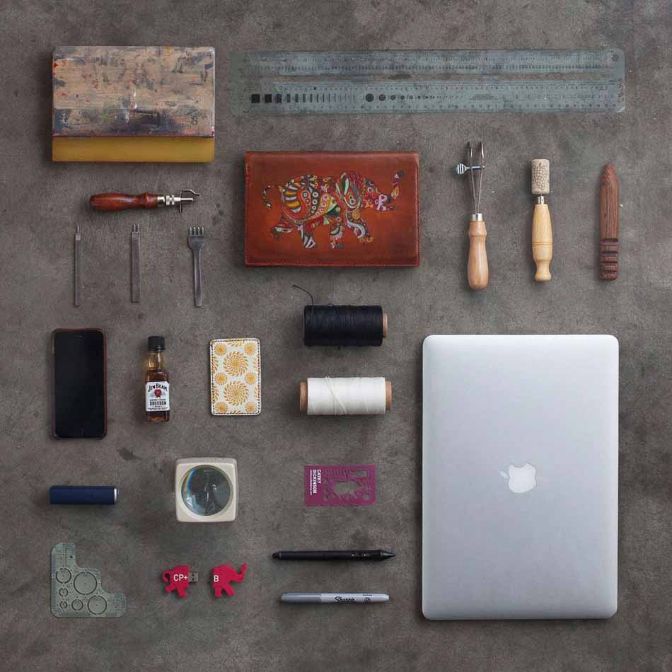 Knolling photography of items found on the desk of art department artist at Crispin Porter + Bogusky | Still Life Photography | Shot in Boulder, Colorado for Crispin Porter + Bogusky