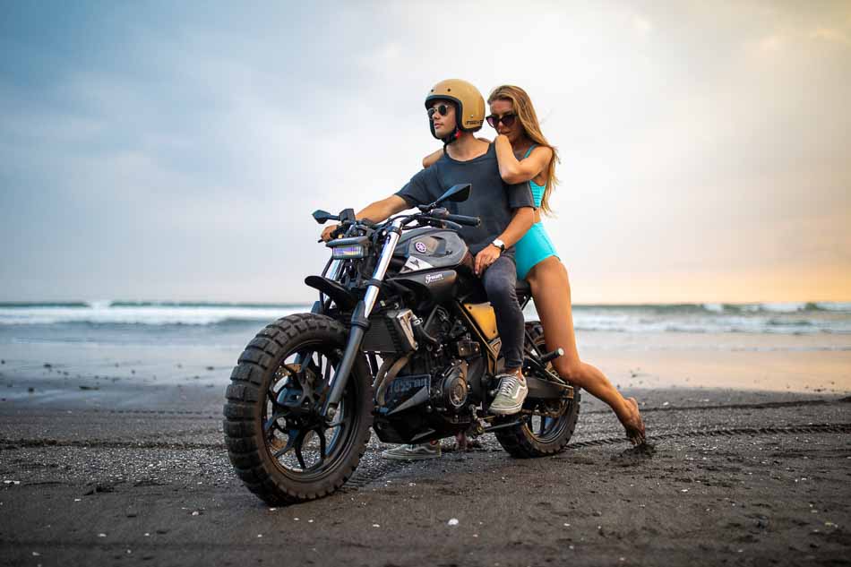 Ukrainian bikini model @alexa_air and man ride a motorcycle on a black sand beach | Swimwear | Lifestyle Photography | Canggu, Bali, Indonesia